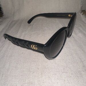 Gucci Women's Black Sunglasses with Gold Accent